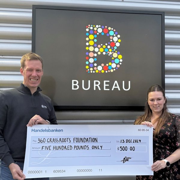(L-R) Bureau Technical’s Richard Suddards presenting a cheque to Sophie Homes, Chair of 360 Grass Roots Foundation